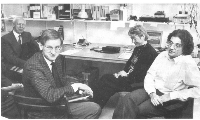 Then Prime Minister Carl Bildt visiting Henryk and colleagues at Textalk, seated among early computer equipment in the office.